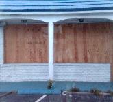 Emergency board up services,boarding up broken door and window,storefront